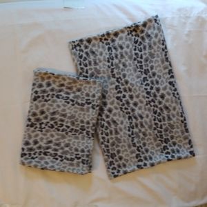 (A10) Two leopard patterned full size pillow cases....